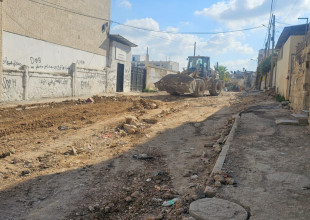 أعمال تأهيل وتسوية مدخل زنوبيا المؤدي لمخيم طولكرم