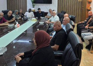 استقبال لجان خدمات مخيمي طولكرم ونور شمس في دار البلدية